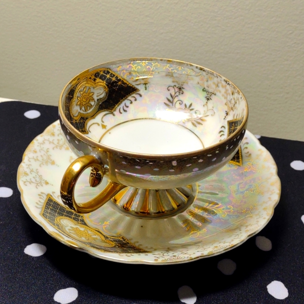 Matching Black and Gold tea cup set